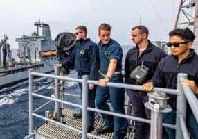 Veteran's on dock looking at ships
